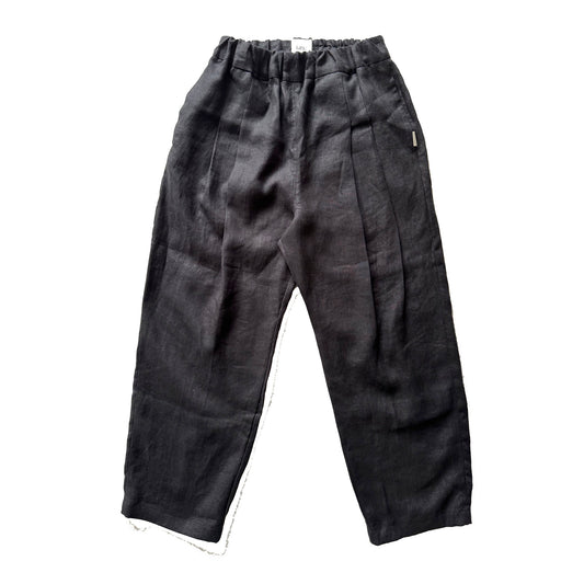 black linen pleated trousers