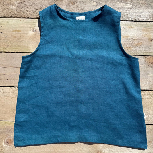 teal coloured vest