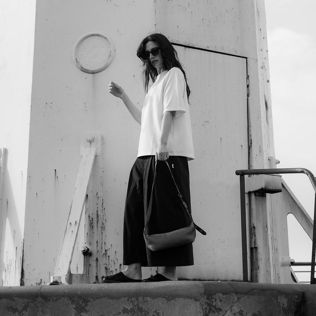 black and white image of woman in culottes